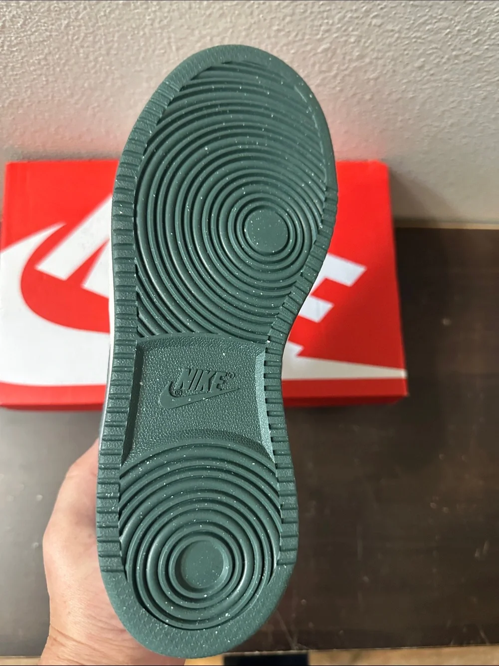 Nike White Low-Top Sneakers with Dark Green Swoosh and Heel